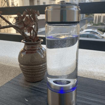 Customer with visibly glowing skin after using the LifeWater Bottle